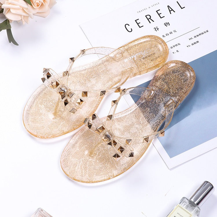 New style rivet shoes, bow shaped flip flops, summer beach outings, flat bottomed transparent jelly crystal slippers for women