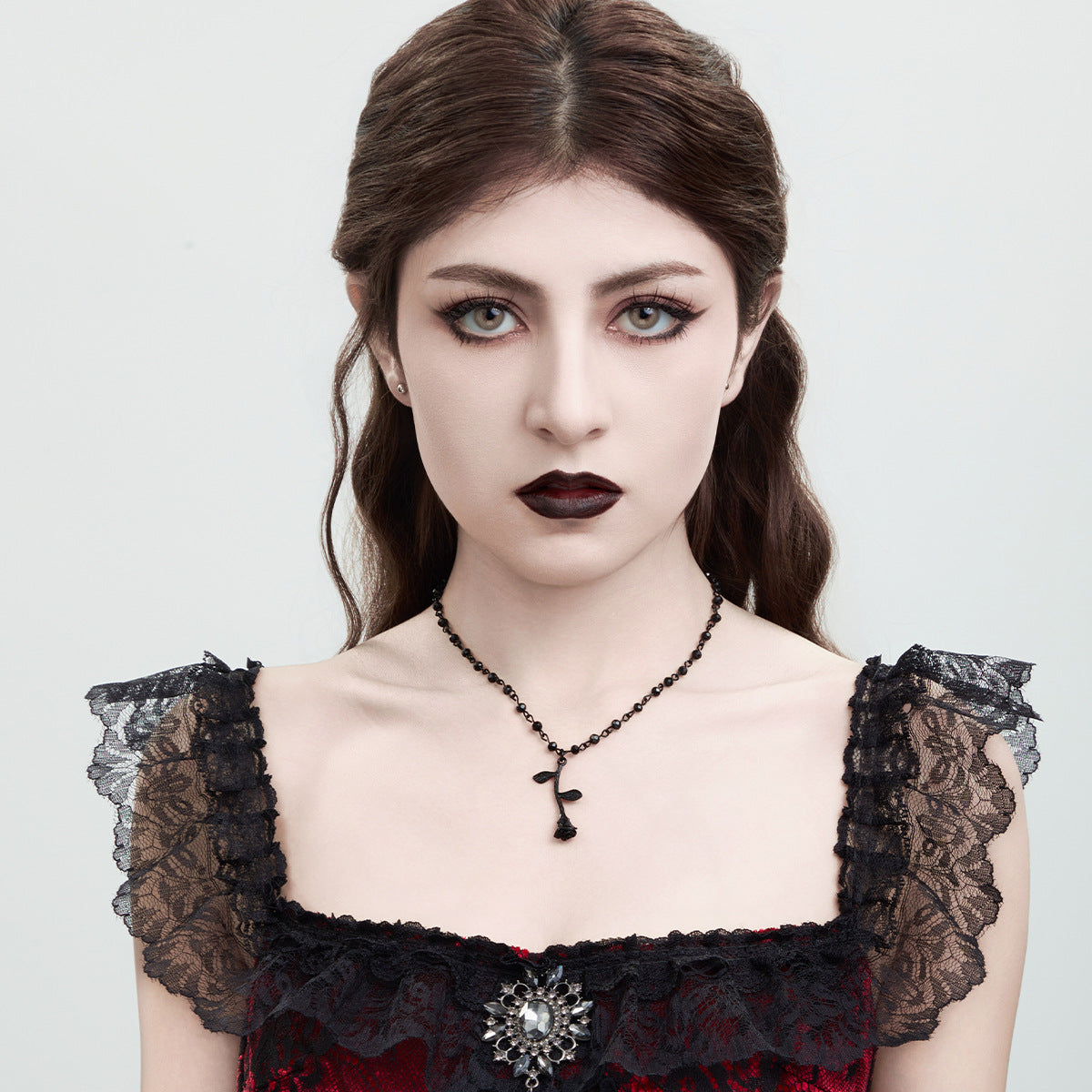 Fashionable rose bead necklace with dark crystal beads and collarbone chain