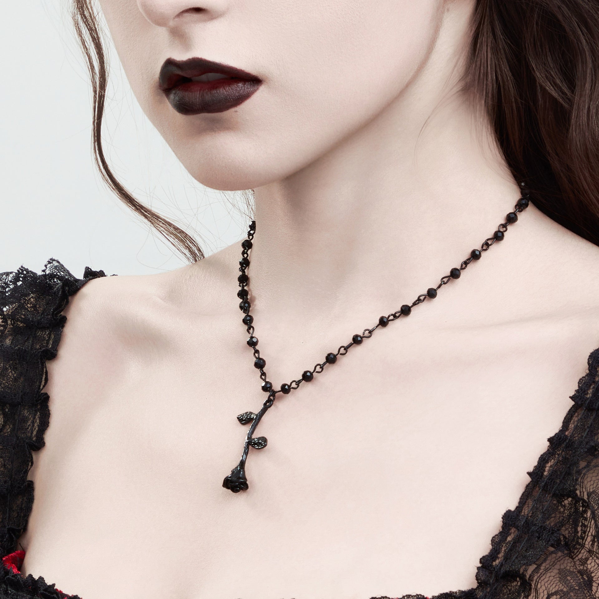 Fashionable rose bead necklace with dark crystal beads and collarbone chain